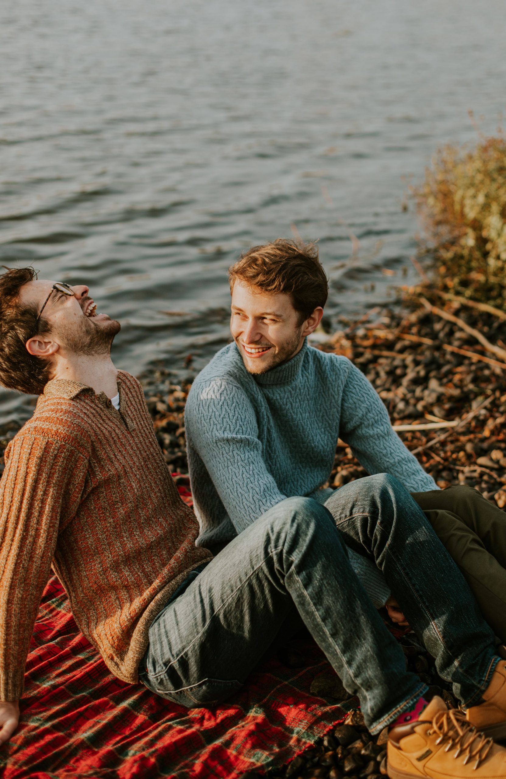 2 young men sitting by a river, what to do after you get engaged