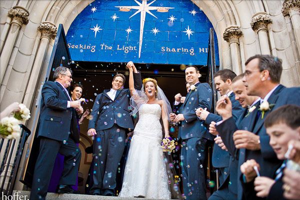 Etiquette Q&A_ _Do We Need to Have a Receiving Line__ wedding couple exiting a church tops tips on a wedding receiving line