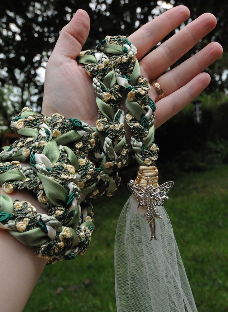 Registration Photo of handfasting ribbons on a hand