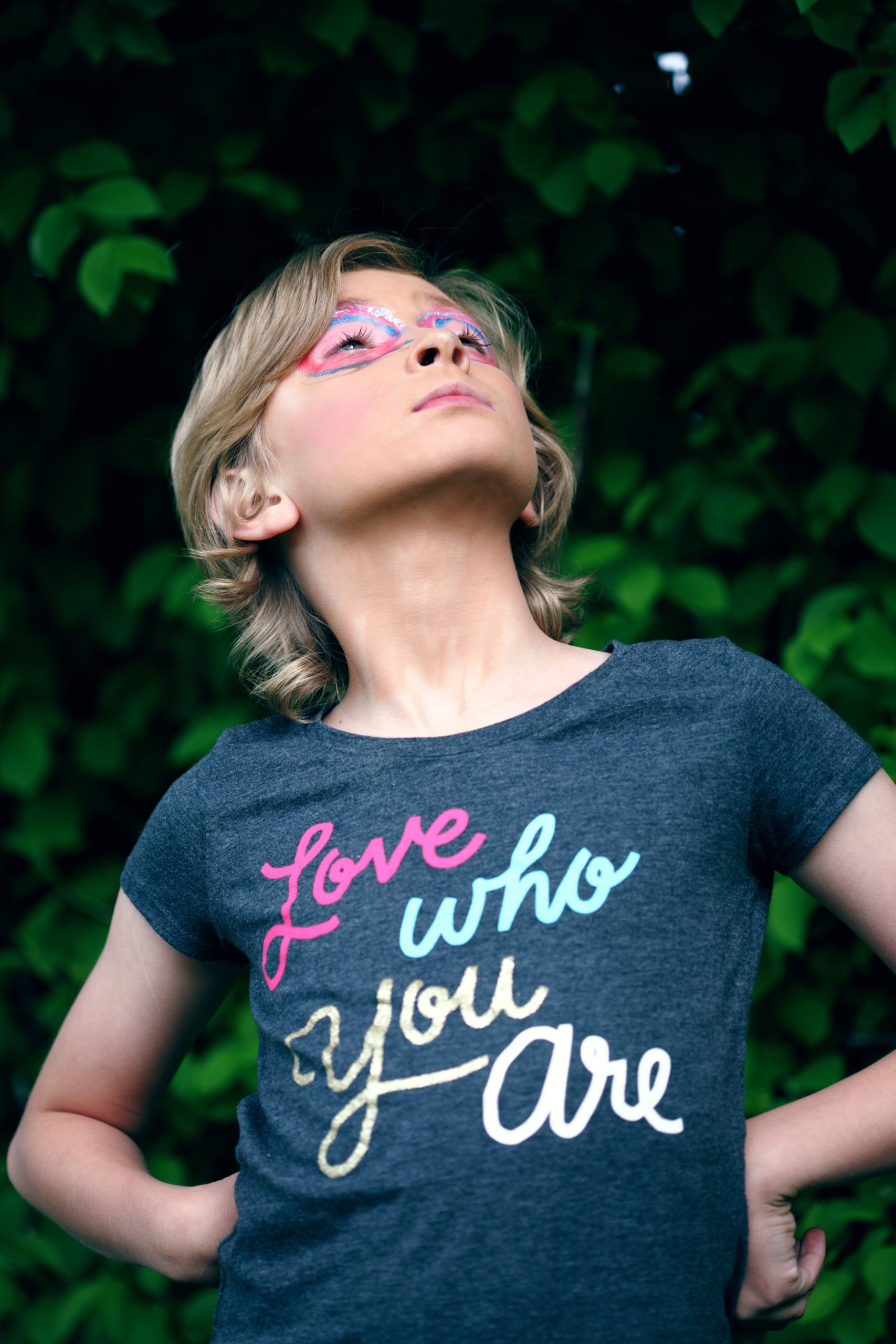 sharon-mccutcheon-wx3JOq0Xbh4-unsplash young child with a tshirt saying love who you are on it family and naming ceremonies in aberdeen