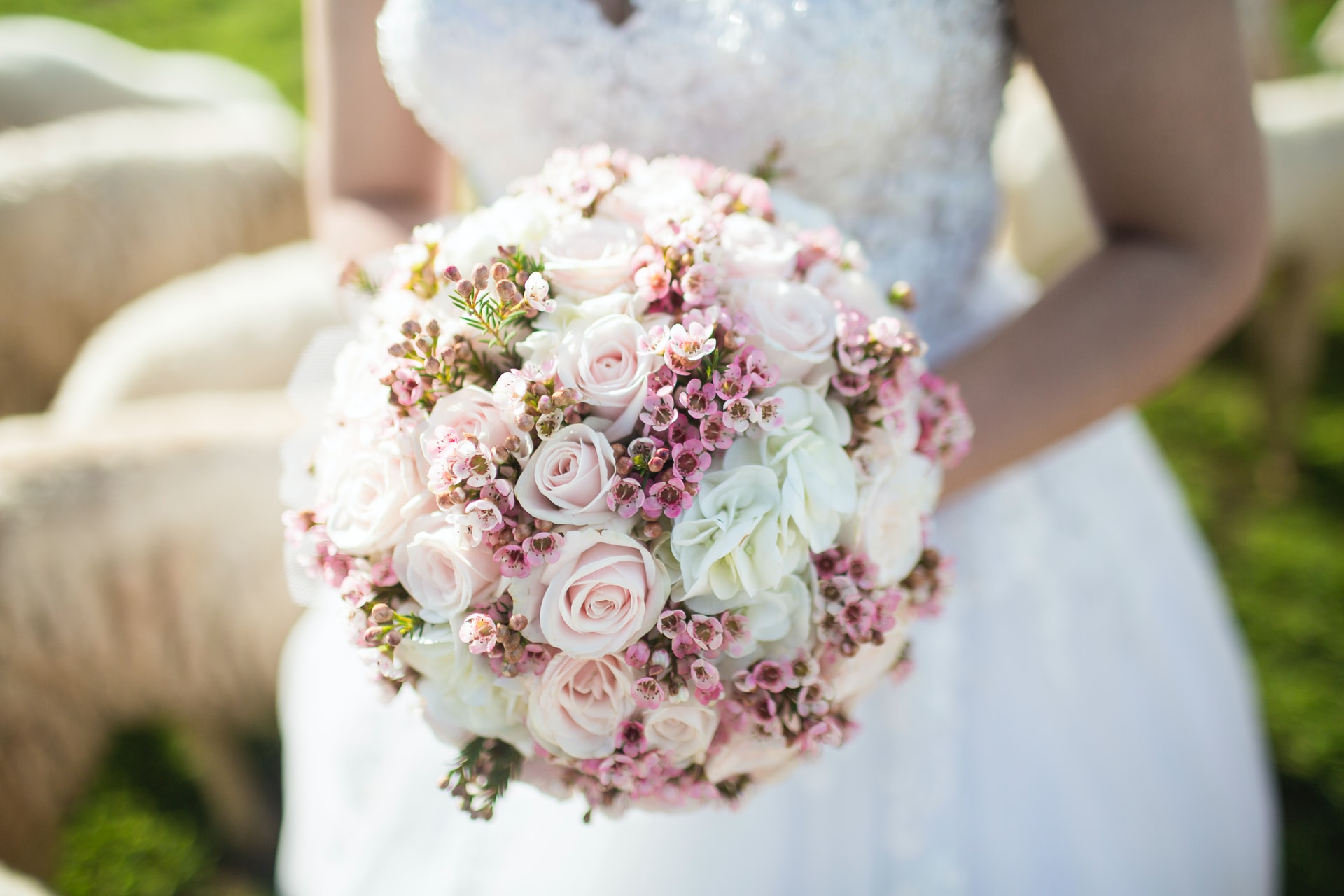 orio-nguyen-pTrHHGrxeOE-unsplash photo of a round wedding bouquet about types of wedding bouquet with the celebrant angel aberdeen