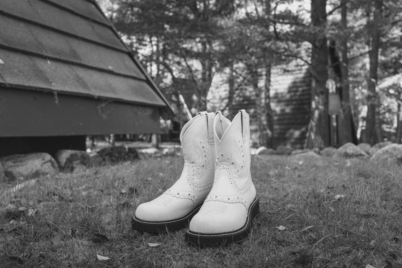 a pair of white cowboy boots a bride had on her wedding day