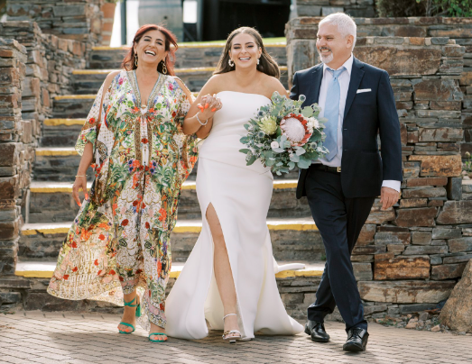 2 parents walking a bride down the aisle with the celebrant angel aberdeen