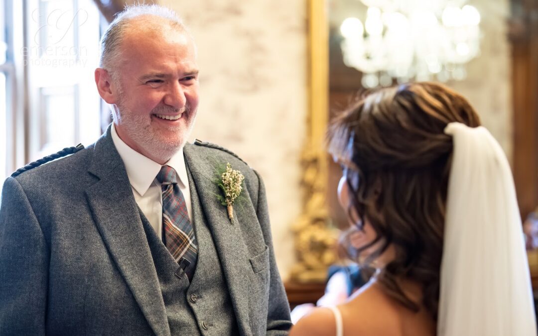 Couple laughing during their wedding ceremony at Ardoe House Aberdeen